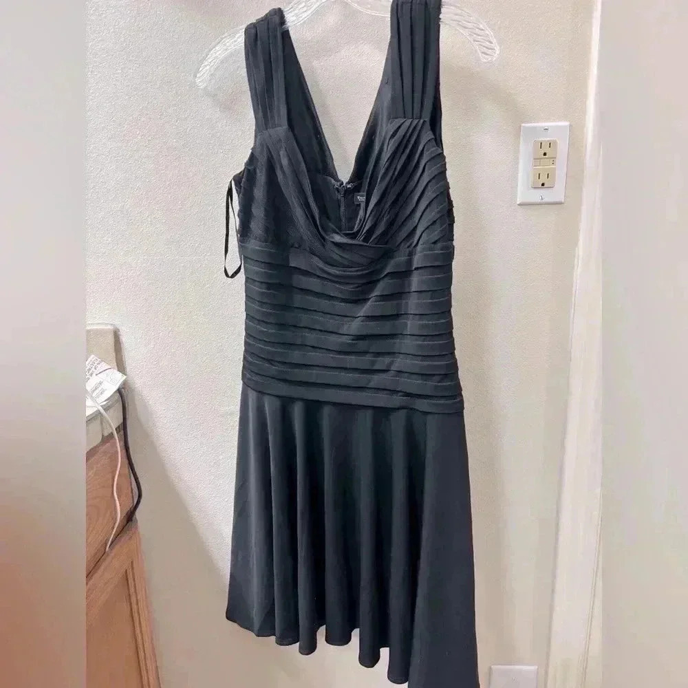 WHBM party dress 👗 in black! Size 8. Worn one time. Perfect for holidays!